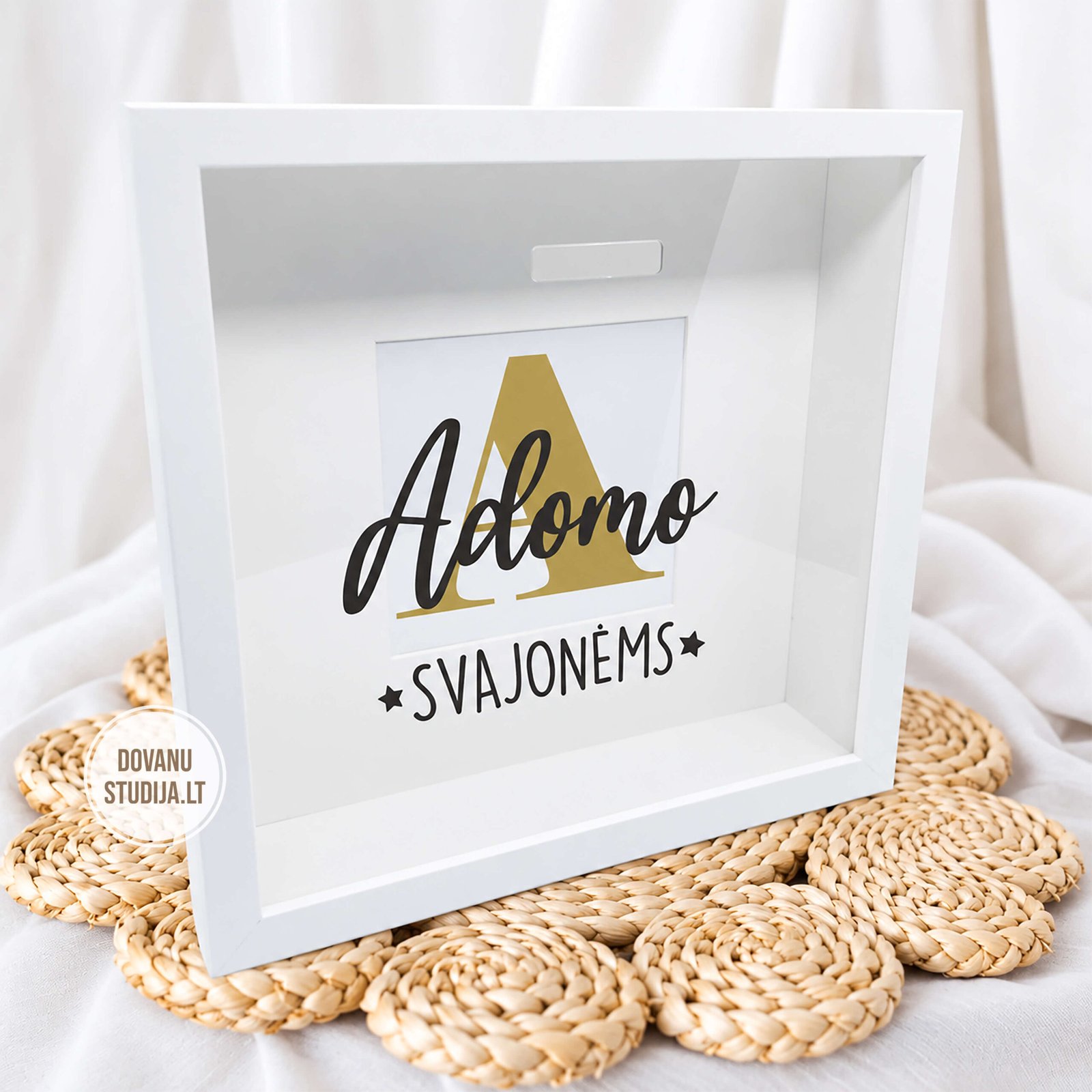 Adomo svajonių rėmelis ant natūralaus kilimėlio
